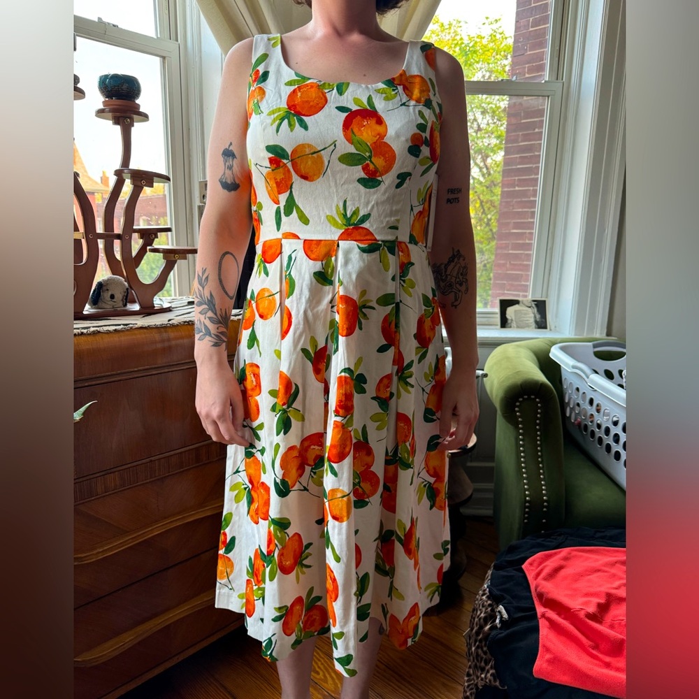 NWT sz14 fit/flare sleeveless dress all over pattern of bright oranges & leaves